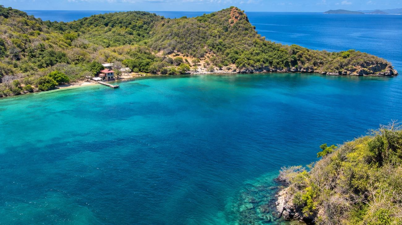 Clear blue water in a bay on Chacachacare island